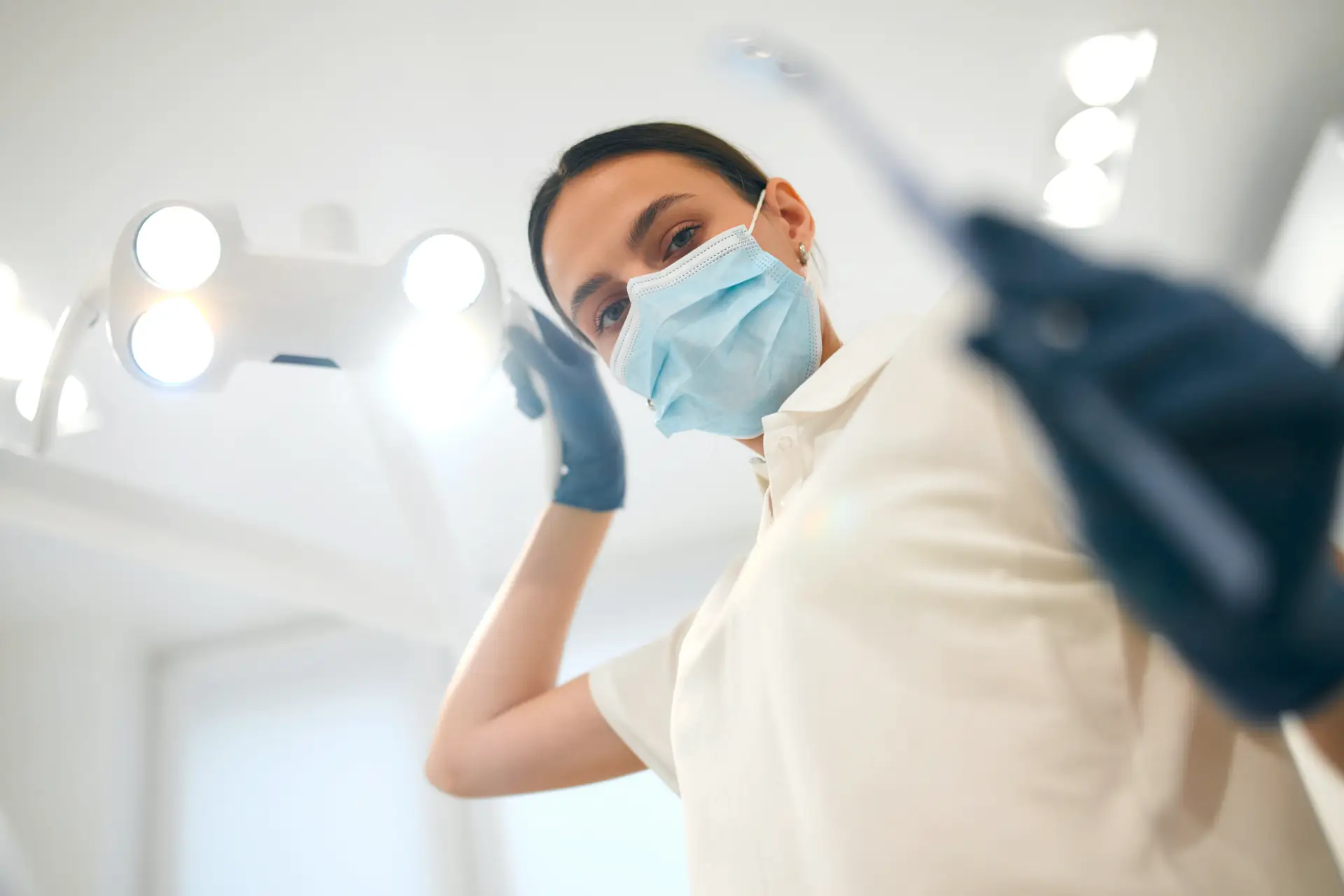 Dentist preparing for examination