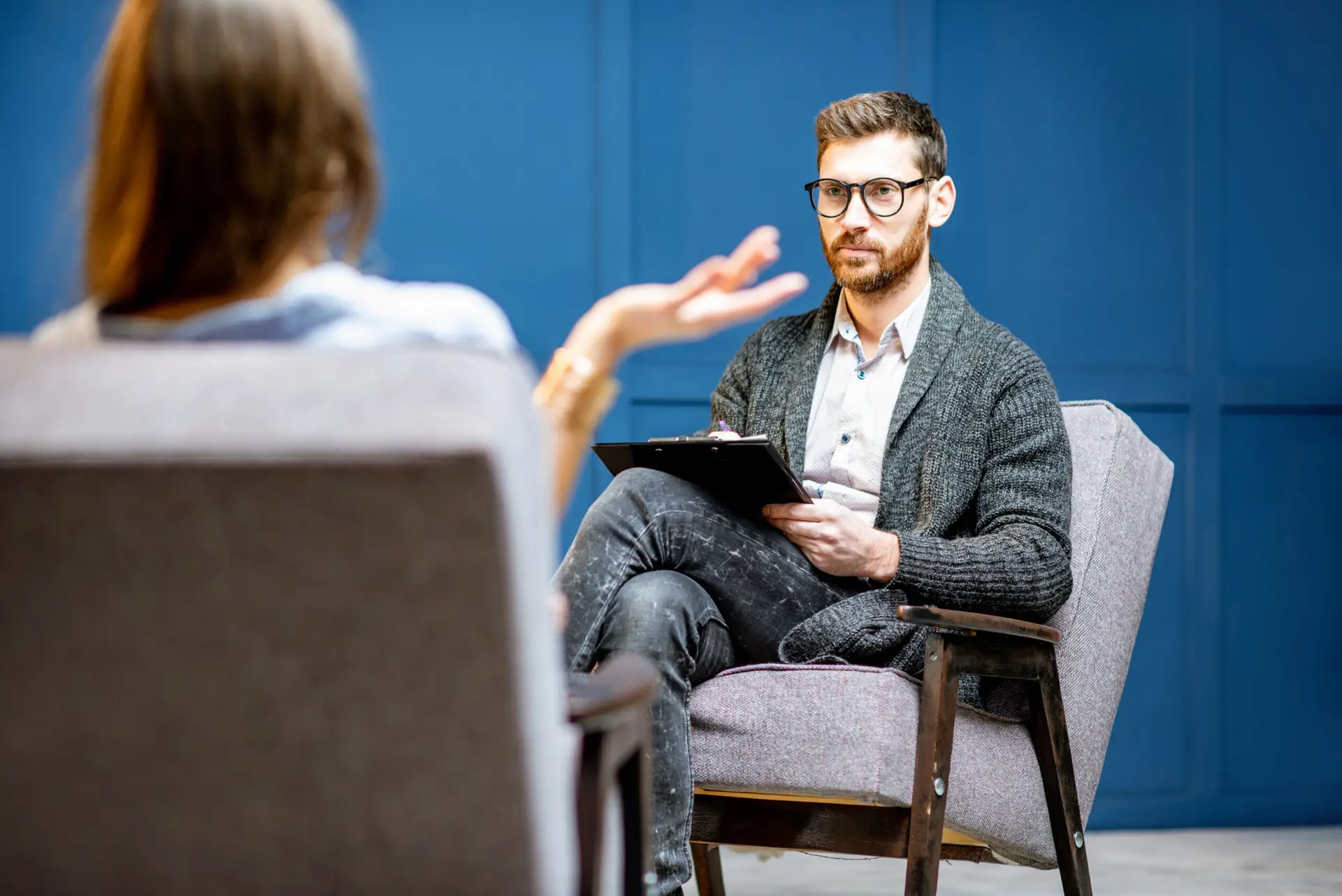 Psychologist with client in therapy